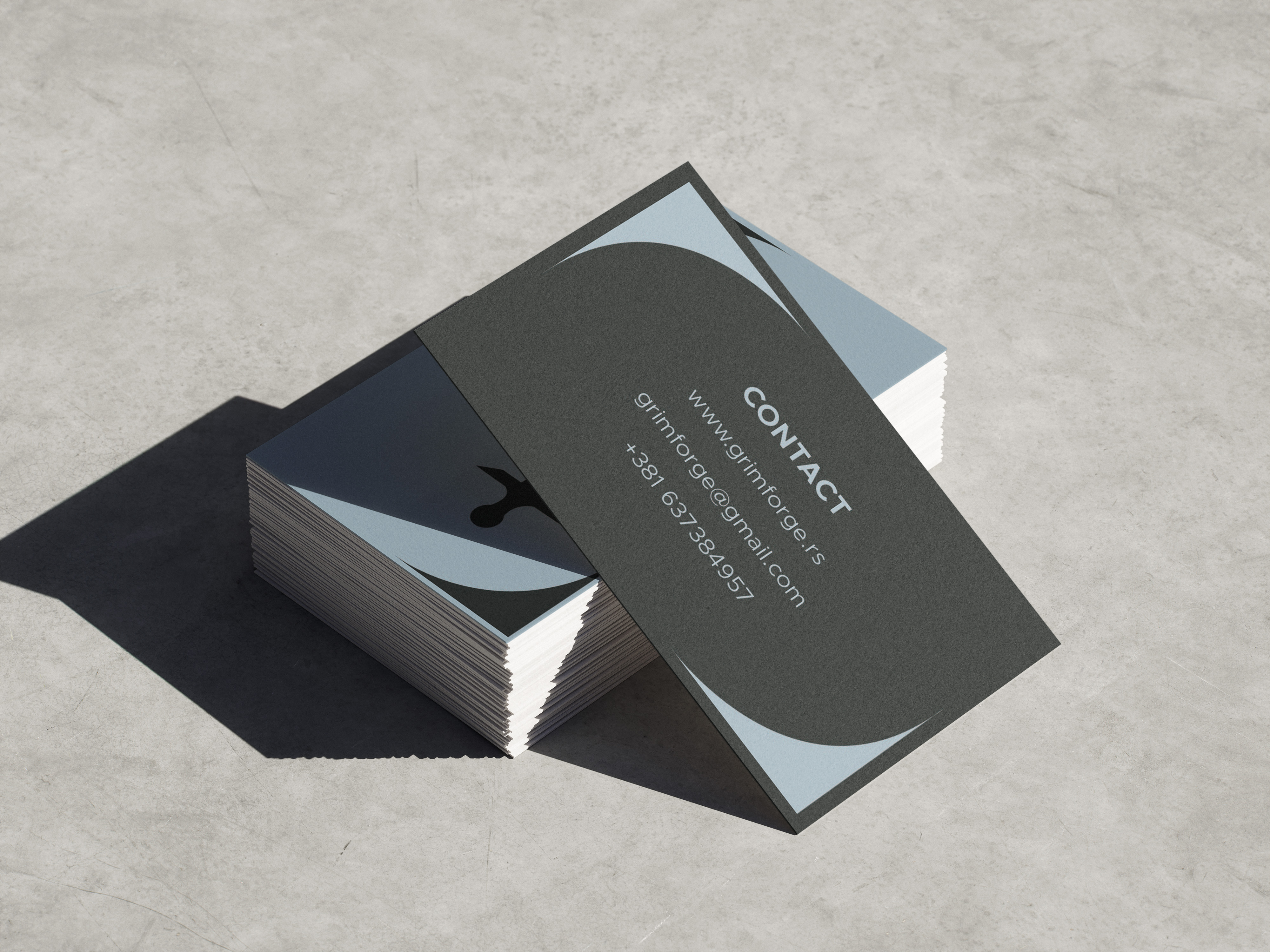Business card mockup for ''Grim Forge''